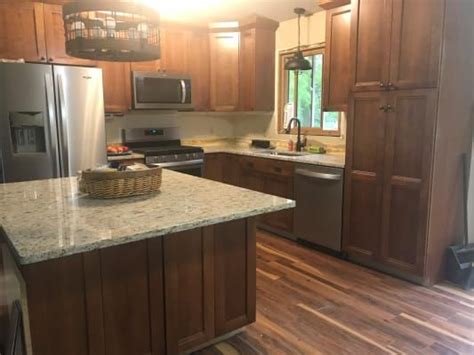 If you install heavy cabinetry such as kitchen cabinets on top, it will inhibit the floor from expanding and contracting, and can lead to issues such as buckling and damaged locking systems. CoreLuxe Ultra 8mm Tobacco Road Acacia Engineered Vinyl ...