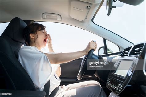Yawning Female Driver Falling Asleep At The Wheel Concept High Res