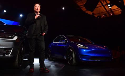 A Low Key Elon Musk Unveils Tesla Model Y Crossover Suv Time