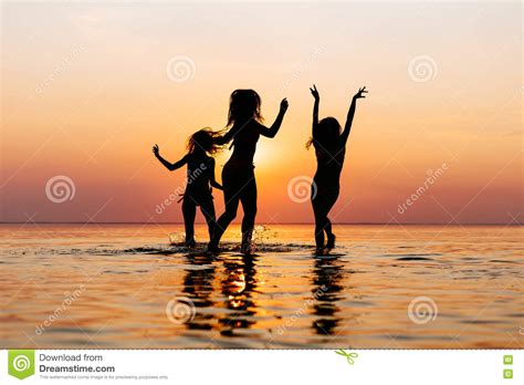Vacation Beach Party Teenage Girls Having Fun In Water