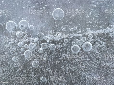 Air Bubbles Frozen Into Ice In Winter Stock Photo Download Image Now
