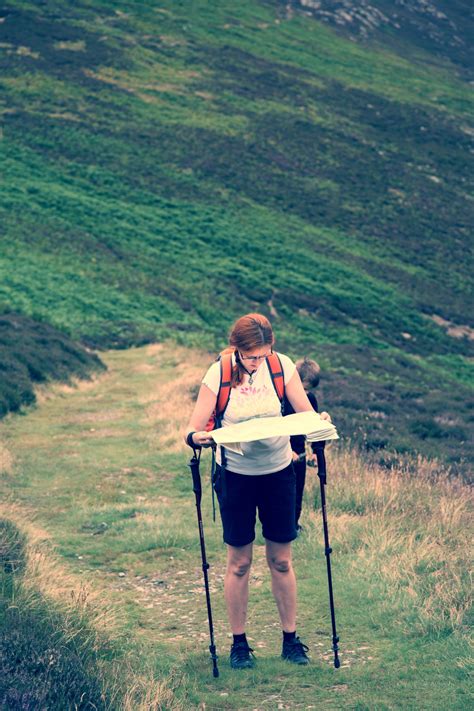 Woman Tourist In Nature Read Map Free Stock Photo Public Domain Pictures