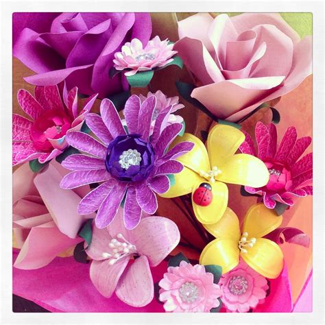There Are Many Different Flowers In The Bouquet