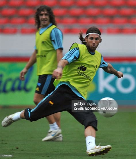 Spanish Defender Sergio Ramos Controls The Ball During A Training