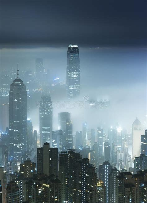 Foggy Night View Of Victoria Harbor In Hong Kong City Stock Image