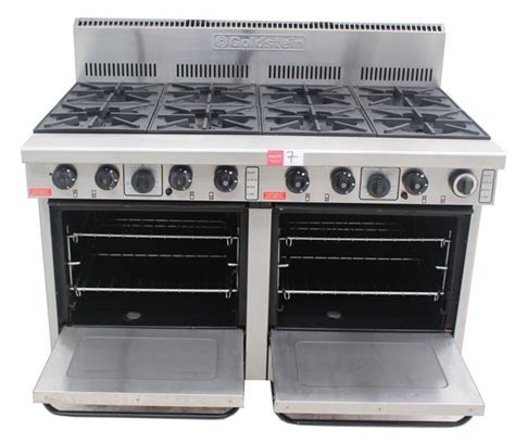 This is a side burner aluminum can stove. GOLDSTEIN GAS 8 BURNER STOVE WITH DOUBLE OVEN, COMMERCIAL ...