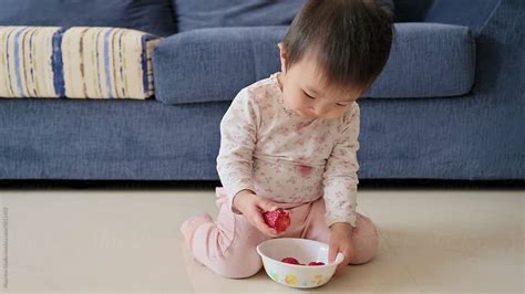 Cute Girl Eating At Home By Stocksy Contributor Maahoo Stocksy