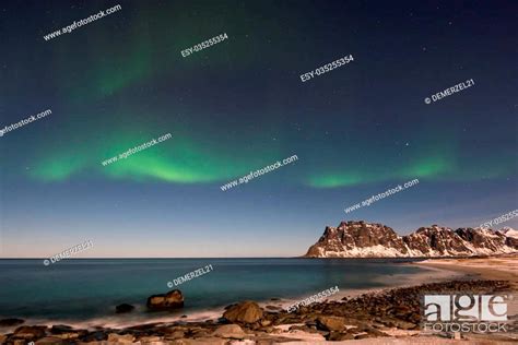 Northern Lights Over The Sea At Utakleiv Beach Lofoten Islands Norway