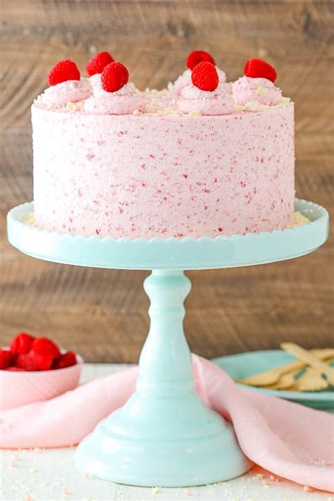 Which was pre formed into the other cake tin, and poured on more chocolate, and dipped some strawberries, in the chocolate of course, and froze. White Chocolate Raspberry Mousse Cake - Life Love and Sugar
