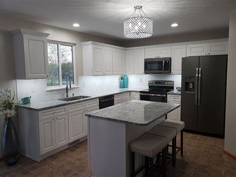 Kitchen cabinets with the table is the perfect furniture to serve every facility in the kitchen. Tahoe White RTA (Ready to Assemble) Kitchen Cabinets Online