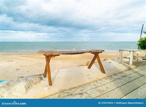 Wood Bench On Beach With Sea Beach Background Stock Image Image Of