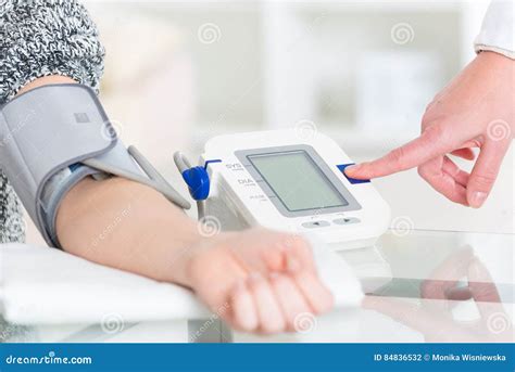 Doctor Measuring Blood Pressure Stock Photo Image Of Clinic Exam