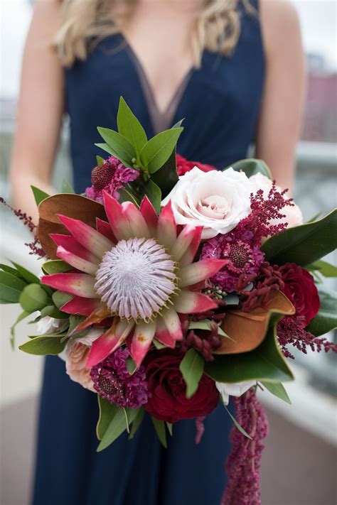 Some of the technologies we use are necessary for critical functions like security and site integrity, account authentication, security and privacy preferences, internal site usage and maintenance data, and to make the site work correctly for browsing and transactions. Burgundy protea bouquet | Wedding bridesmaid bouquets ...