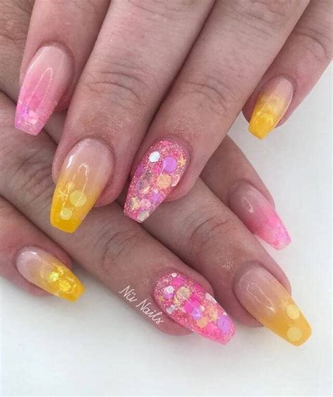 25 Gorgeous Yellow Nails to Spice Up Your Fashion ... Even if it may clash with your outfit, sometimes the cheeriness in a manicure is this pink and yellow design uses clean black lines and bold geometric shape to create such a cool modern look.