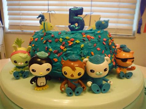 Homemade Octonauts Bundt Cake With Fish Themed Candles And Characters