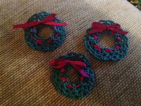 wreath lapel pins these took minutes to crochet a day to dry after the fabric stiffener was
