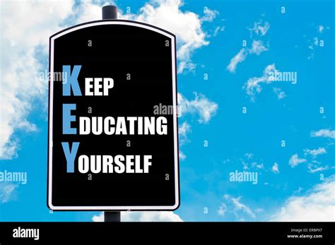 Key As Keep Educating Yourself Motivational Quote Written On Road Sign