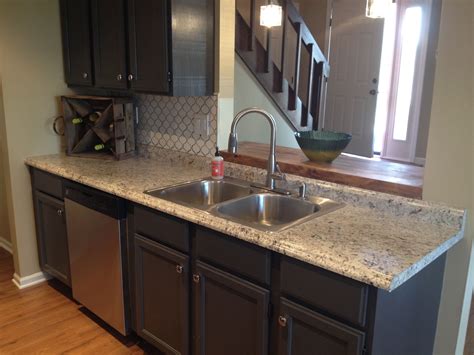 Dressed Up This Distressed Kitchen By Spray Painting The Countertops To