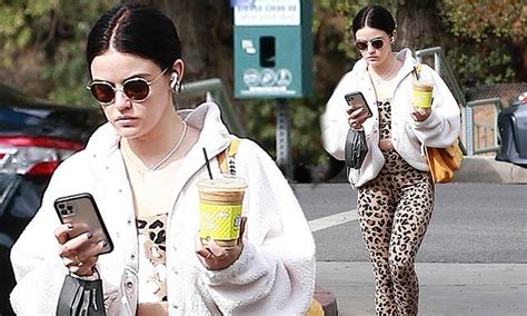 Lucy Hale Flashes Her Abs In A Leopard Print Sports Bra And Leggings