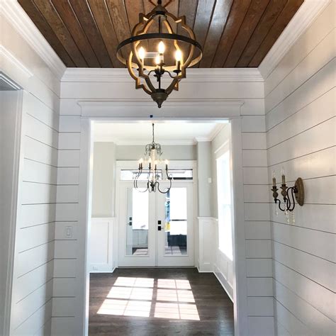 Finding beauty in our everyday life in the farmhouse. Jennifer Taylor Design - entry, shiplap, stained wood ...