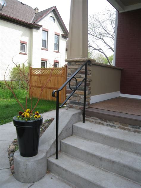 Iron exterior railings offer beauty and security for pedestrians as they traverse terraces, walkways and stairs. Exterior Step Railings | O'Brien Ornamental Iron | Outdoor ...