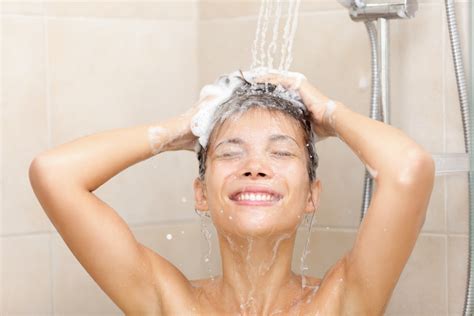 9 Shower Tricks To Keep Your Hair Feeling Fresh Between Washes