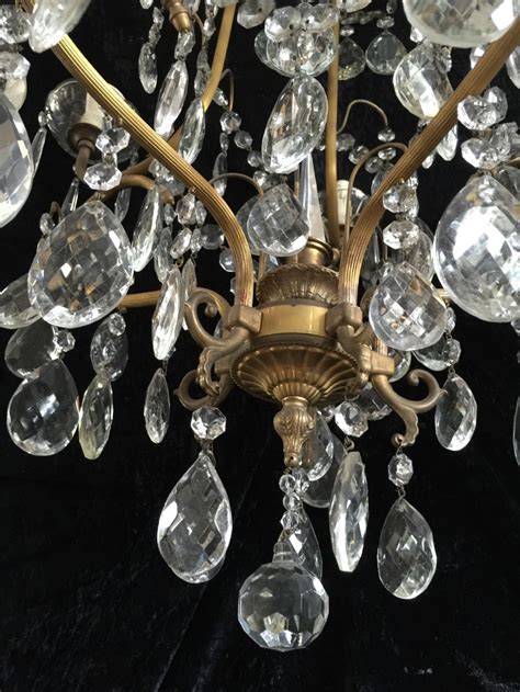 A Pair Of French Brass And Crystal Antique Chandeliers
