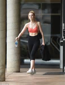 Elle Fanning Flashes Toned Torso In Orange Sports Bra Daily Mail Online