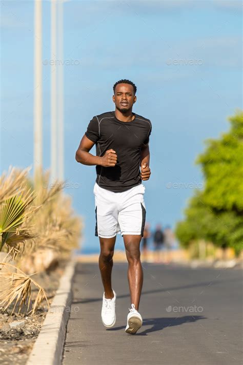 Black African American Young Man Running Outdoor Stock Photo By Sam741002