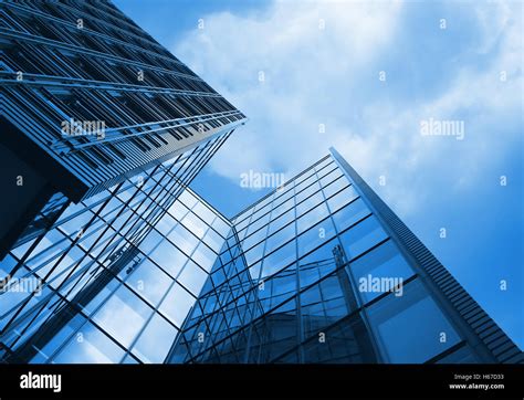 Tall Office Building With Blue Tint To Whole Image Stock Photo Alamy