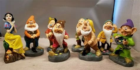 8 Photos Disney Seven Dwarfs Garden Gnomes And Description Alqu Blog