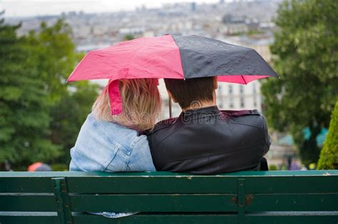 Couple With Umbrella Editorial Image Image Of Resting 57946755
