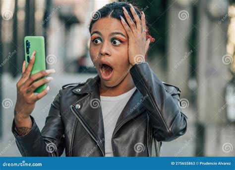 girl in the street with mobile phone and surprised expression stock image image of internet