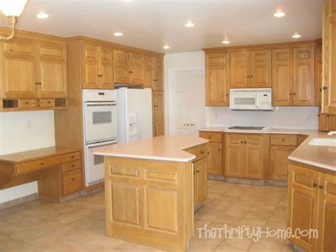 Use a tack cloth to wipe away all the sanding dust from the surface. *The Thrifty Home: Kitchen Remodel - Painting Cabinets without sanding them | Kitchen remodel ...