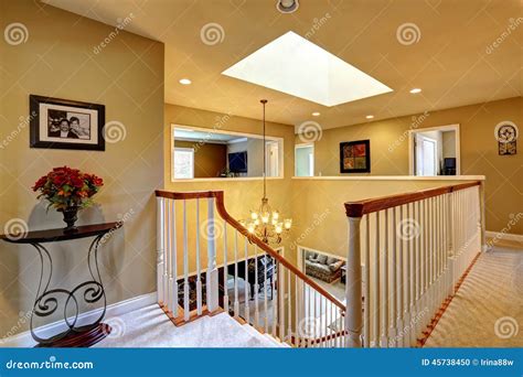 Luxury House Interior Upstairs Hallway With Staircase Stock Photo