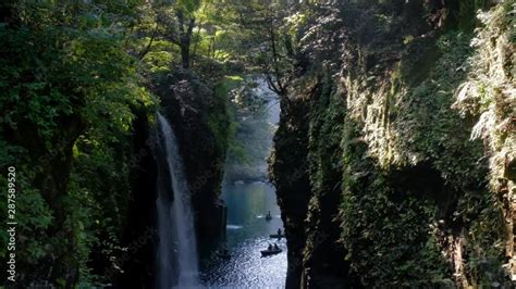Waterfall And Boat At Takachiho Gorge In Takachiho Miyazaki Kyushu