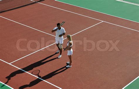 Happy Young Couple Play Tennis Game Outdoor Stock Image Colourbox