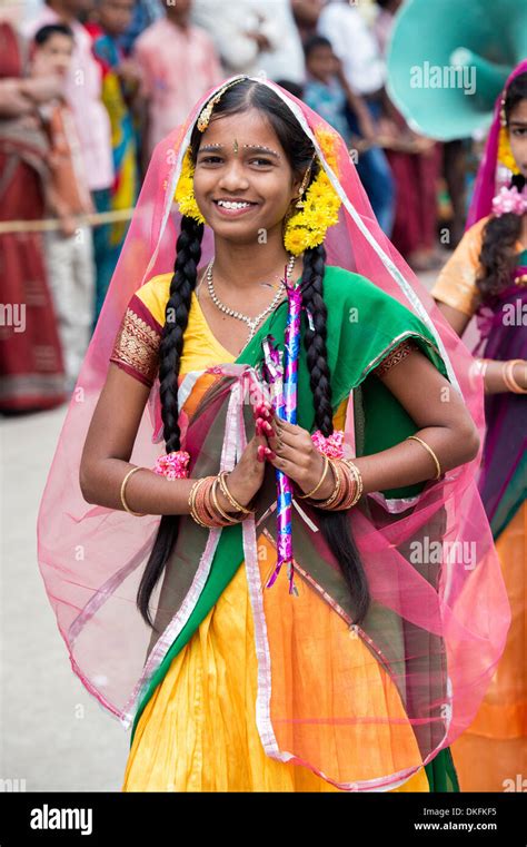 Indian Girls In Traditional Dress Dancing At A Festival In The Streets