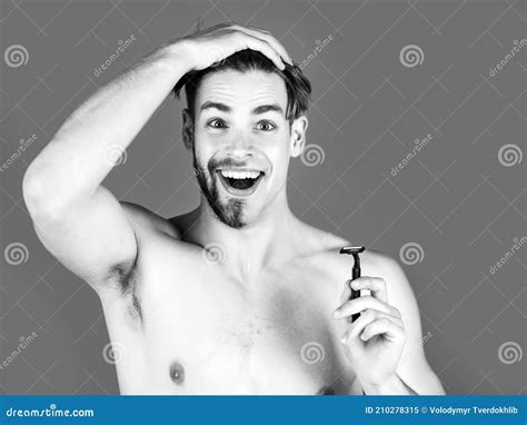 Handsome Man With Half Shaven Face Chin And Beard Moustache Holding Safety Razor With Naked