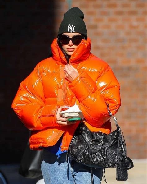 Dua Lipa Shiny Orange Puffer Jacket Hit Jacket