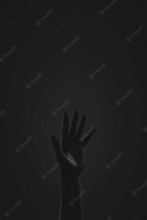 Premium Photo Raised Dark Hand On Dark Background