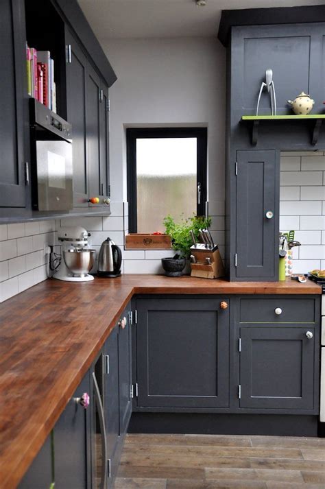 Thinking of painting your kitchen cabinets gray? gray kitchen-cabinets-butcher-block-countertops-cost-lowes ...