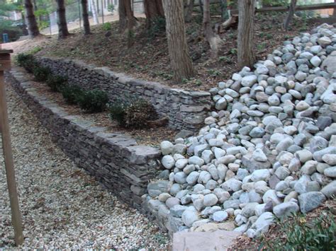 Stone Retaining Wall And Stream Bed Stabilization In One Drainage