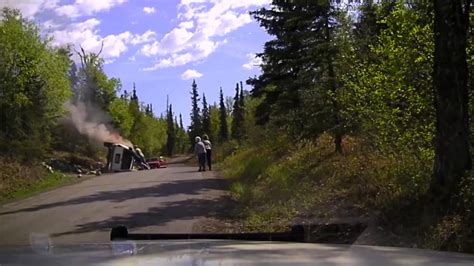 Alaska Cop Recruits Onlookers To Help Push Burning Car Off Trapped