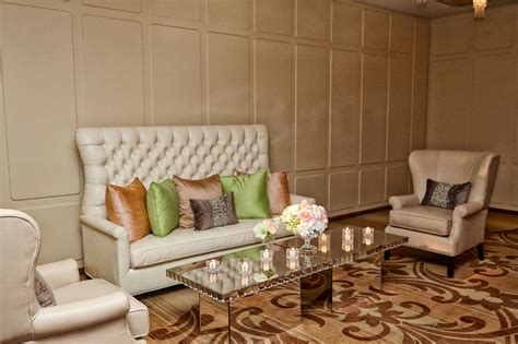 Chic Lounge Area With Green Pillows