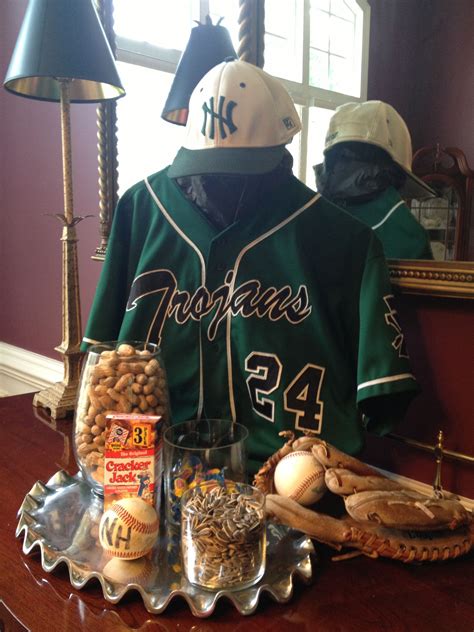 Check out our socially distanced party ideas for your employees. Baseball centerpiece - raised jersey as centerpiece, jersey number as table number, with glove ...
