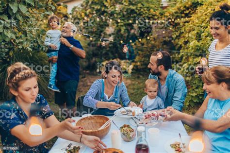 Your next party or event is important, so let zazzle help you find the perfect family dinner invitations and leave you with more time to plan for the big occasion. Multigeneration Family At A Dinner Party Stock Photo ...