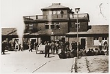 Visitors gather at the entrance to the Buchenwald concentration camp ...