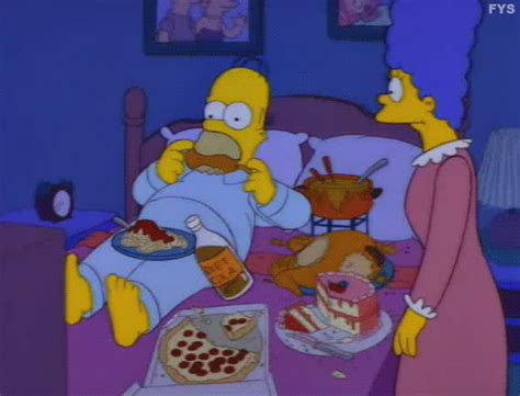 The Simpsons Is Having Dinner In Bed With His Mom And Dad Who Are