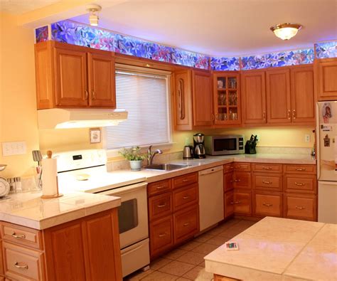 Read through customer reviews, check out their past projects and then request a quote from the best cabinetry and cabinet makers near you. Kitchen Cabinet Faux Stained Glass and LED Lighting : 9 ...